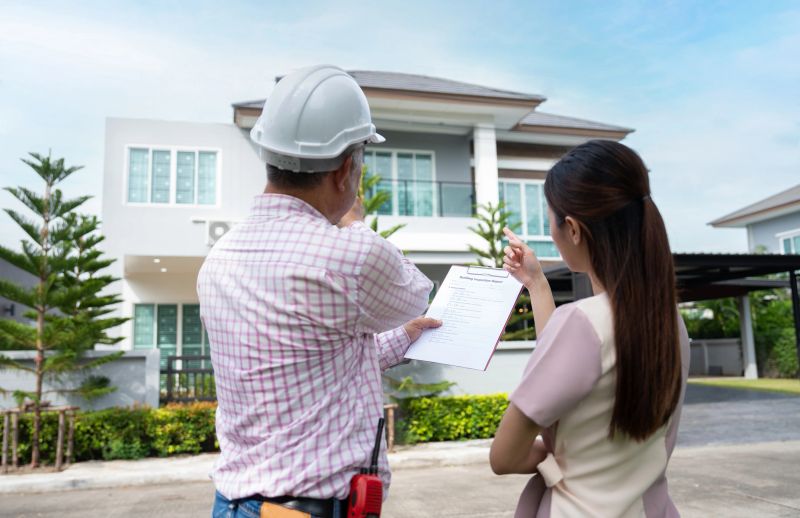 Agent evaluating a residential property